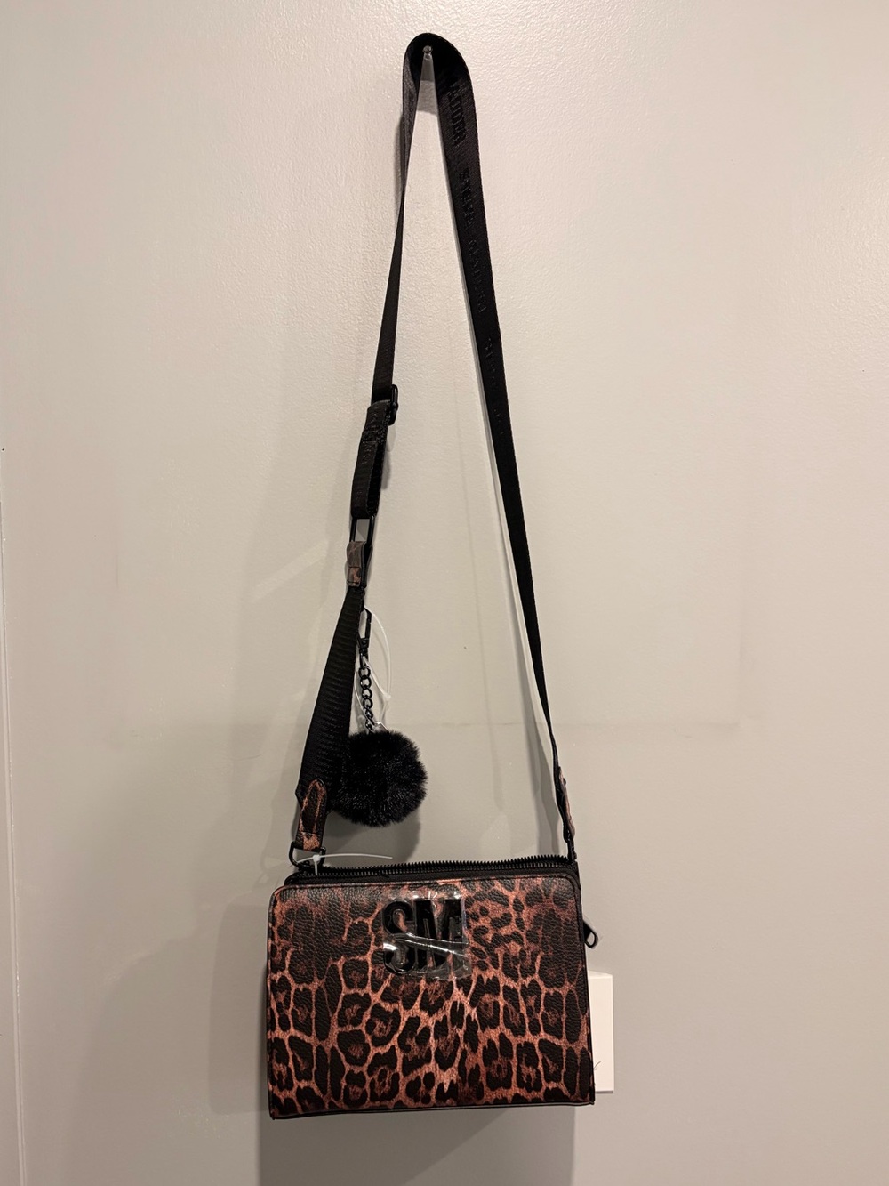 Steve Madden Leopard Print Crossbody in Brown and Black with Pom Pom